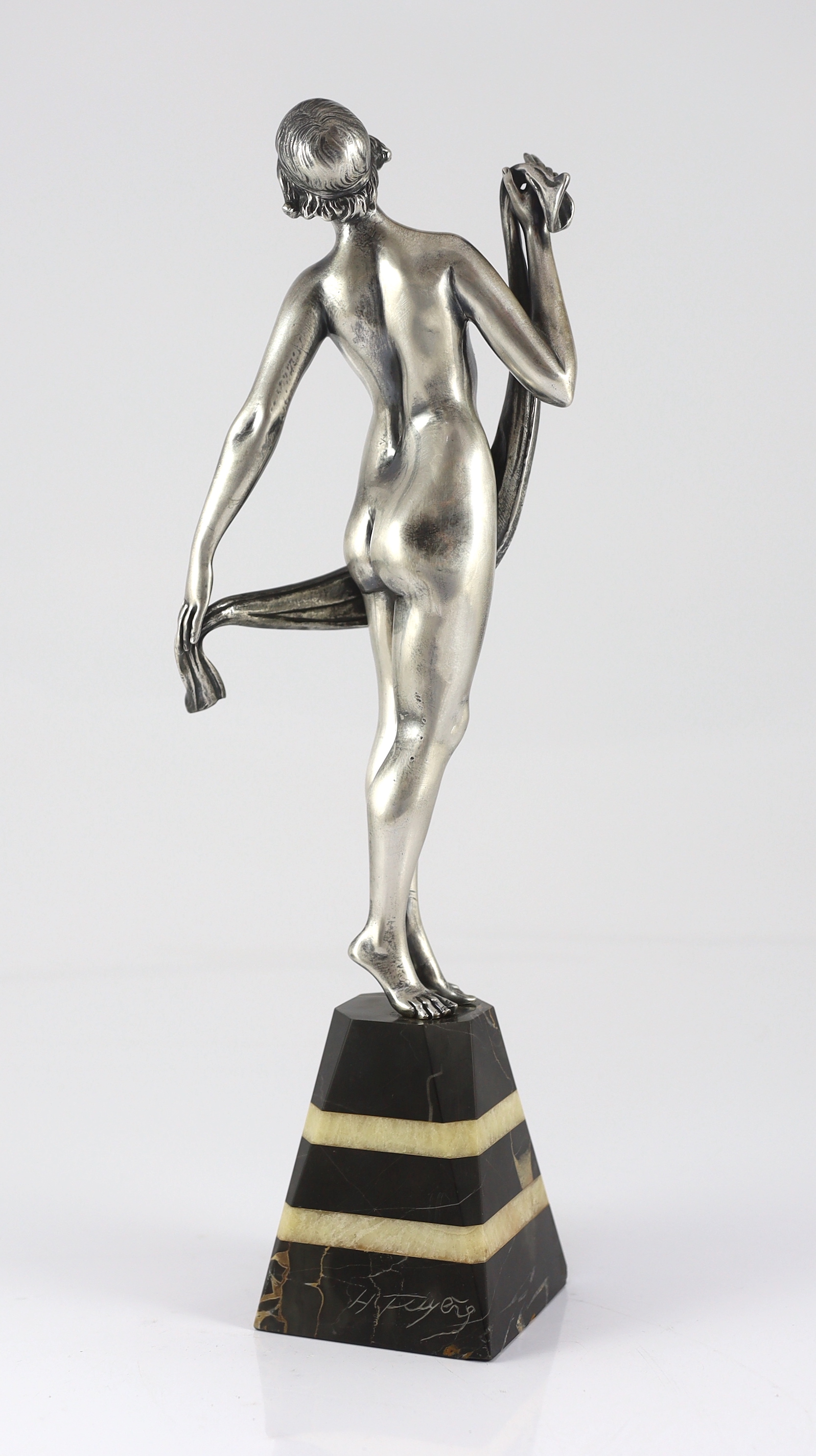 Henri Fugère (1872-1944). An Art Deco silvered bronze figure of a nude dancer 13cm wide, 39cm high